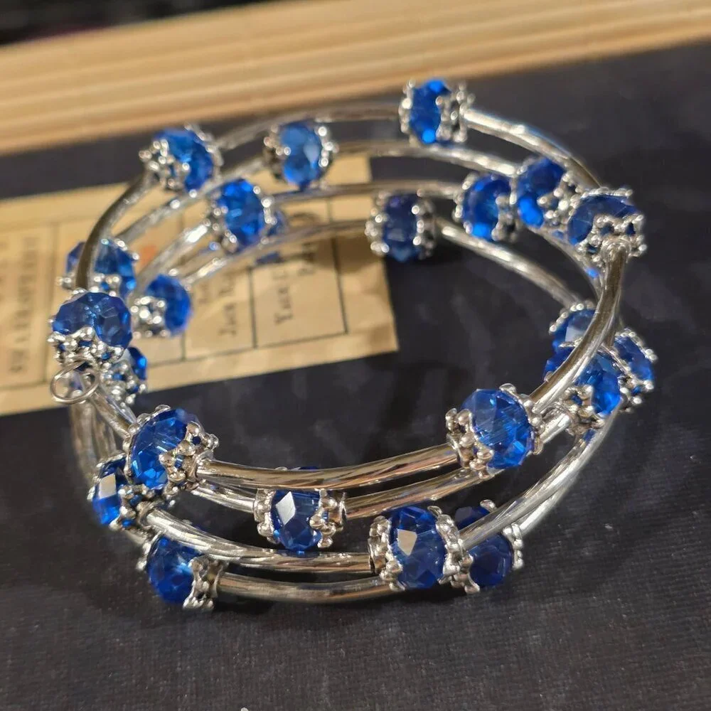 Silver Tone Crystal Wrap Bracelet With Blue Faceted Beads & Filigree Details